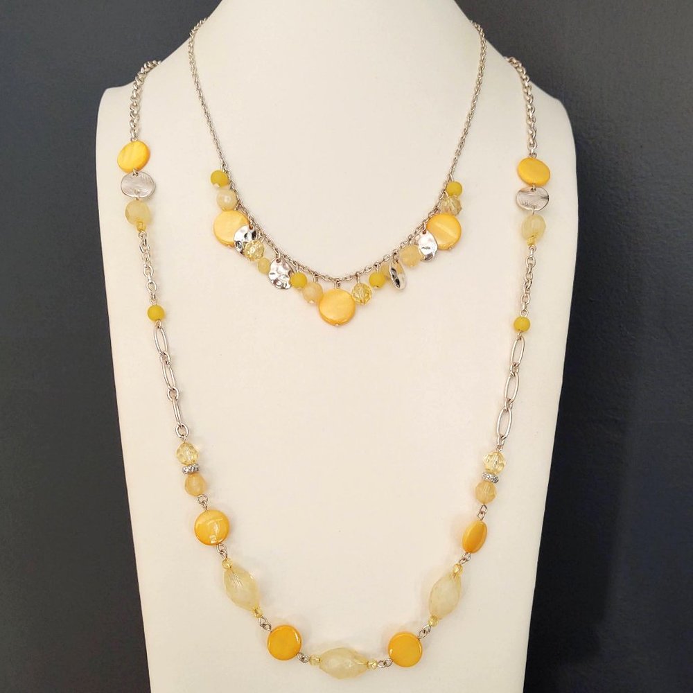 Pair of yellow and silver layering necklaces